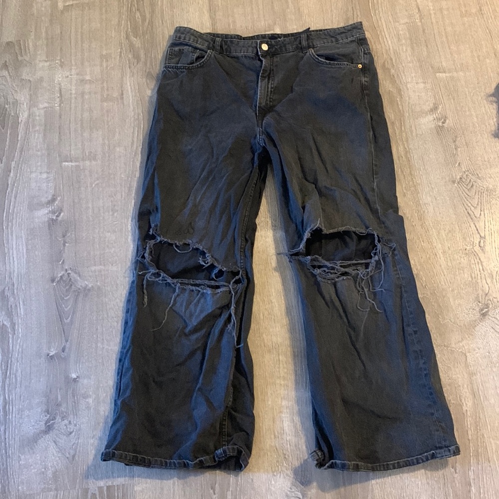 Baggy black ripped jeans